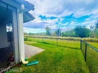 a house with garden in front of it