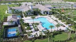 a view of a park with large trees