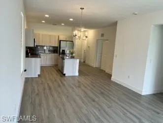 a front view of a house with garden and patio