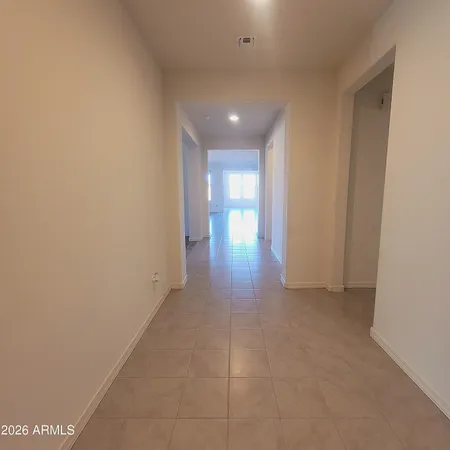 a view of hallway with a window
