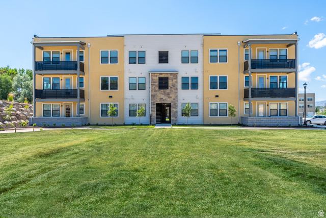 718 West Blue Magic Lane, Unit S201 Midvale, UT 84047 - Photo 14 of 18 View of apartment building / complex