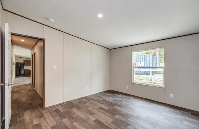 a view of an empty room and window
