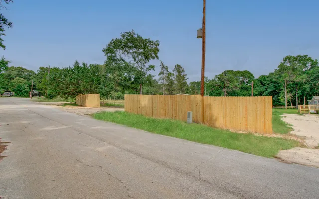 a small garden with a building in the background
