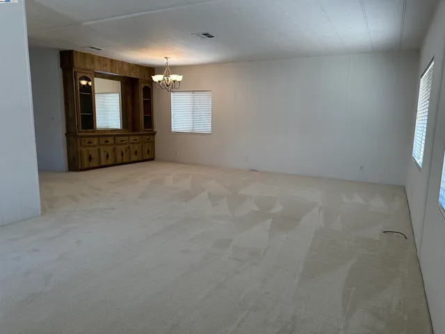 a view of a livingroom with a large window