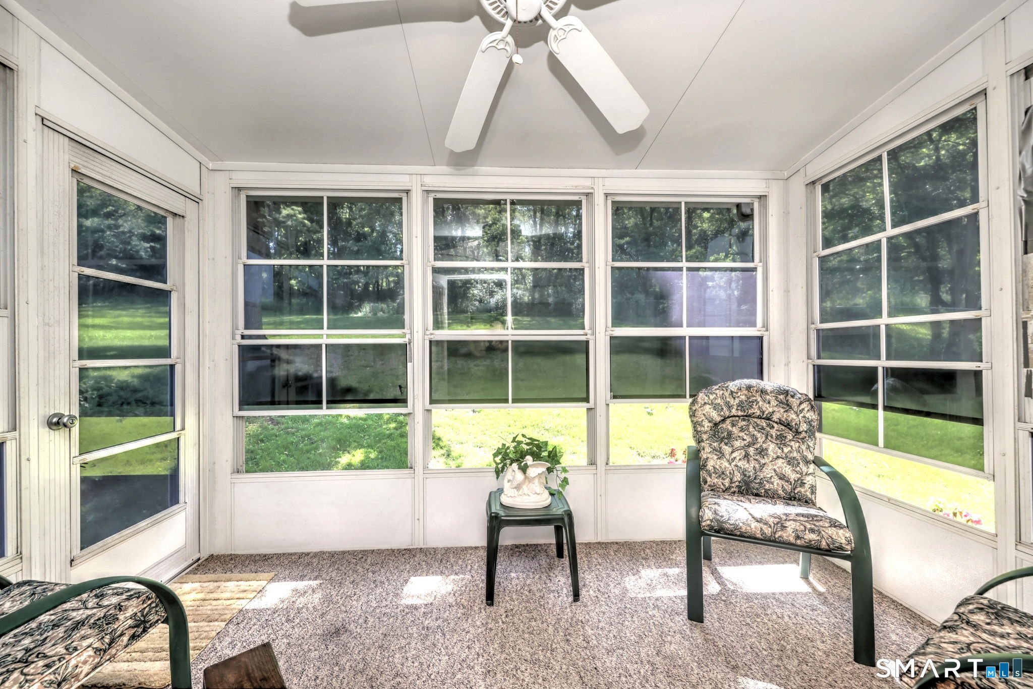 212 Swain Avenue Meriden, CT 06450 - Photo 28 of 38 a balcony with furniture and a window