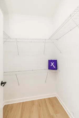 a view of a room with racks on the wall