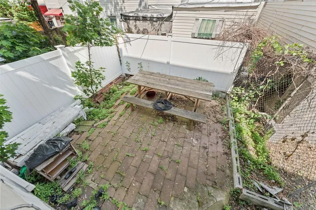 a view of a balcony with chairs