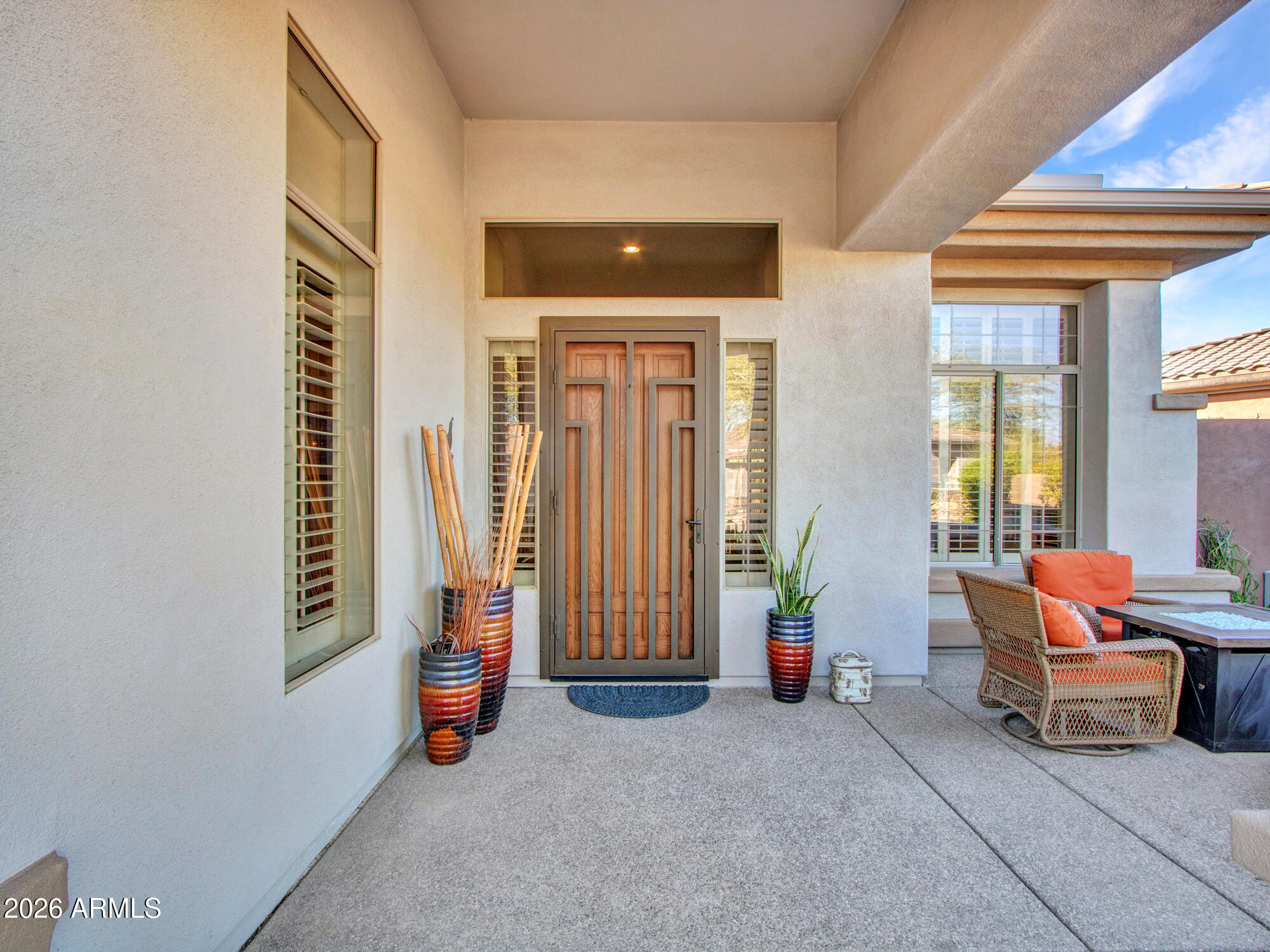 42047 North Moss Springs Road Anthem, AZ 85086 - Photo 9 of 72 a living room with furniture and a window
