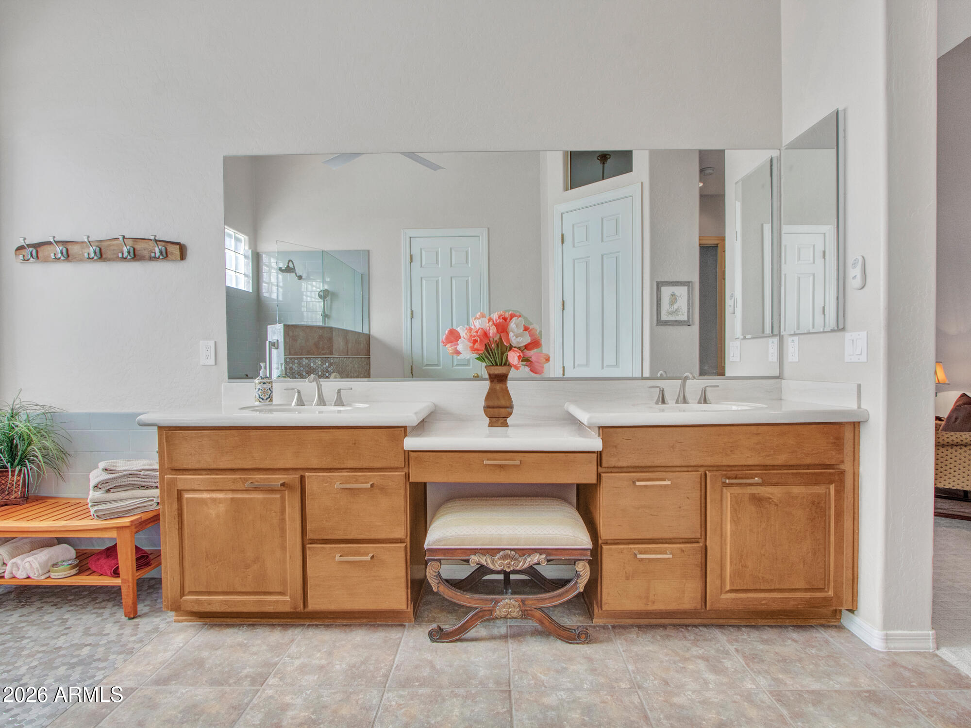 42047 North Moss Springs Road Anthem, AZ 85086 - Photo 36 of 72 a bathroom with a sink and a mirror