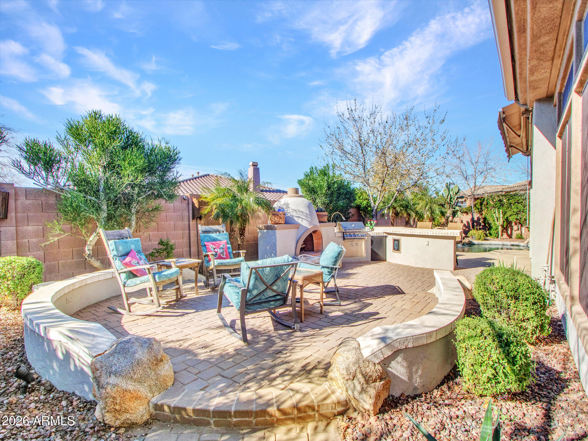 42047 North Moss Springs Road Anthem, AZ 85086 - Photo 48 of 72 a view of house with backyard and sitting area