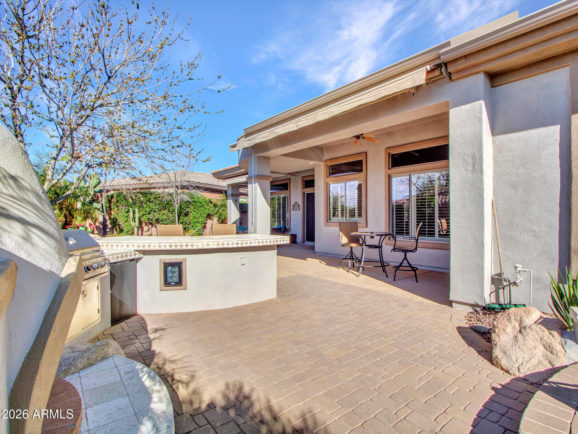 42047 North Moss Springs Road Anthem, AZ 85086 - Photo 51 of 72 a view of a house with backyard and sitting area