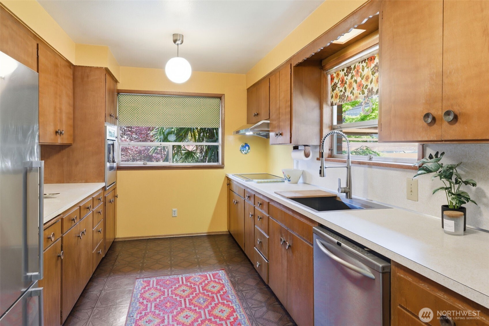 2803 South Walker Street Seattle, WA 98144 - Photo 26 of 40 a kitchen with granite countertop a sink and a stove