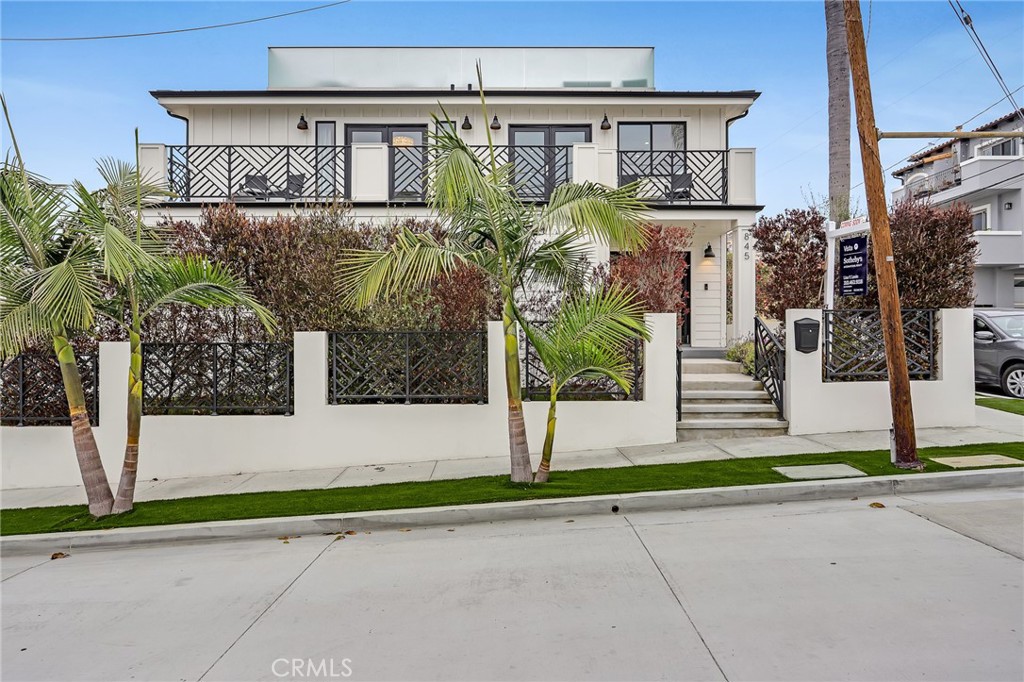 845 4th Street Hermosa Beach, CA 90254 - Photo 1 of 26 a front view of a house with garden