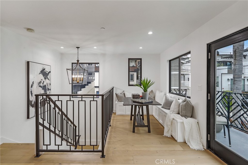 845 4th Street Hermosa Beach, CA 90254 - Photo 10 of 26 a view of a livingroom with furniture and lots of wooden floor