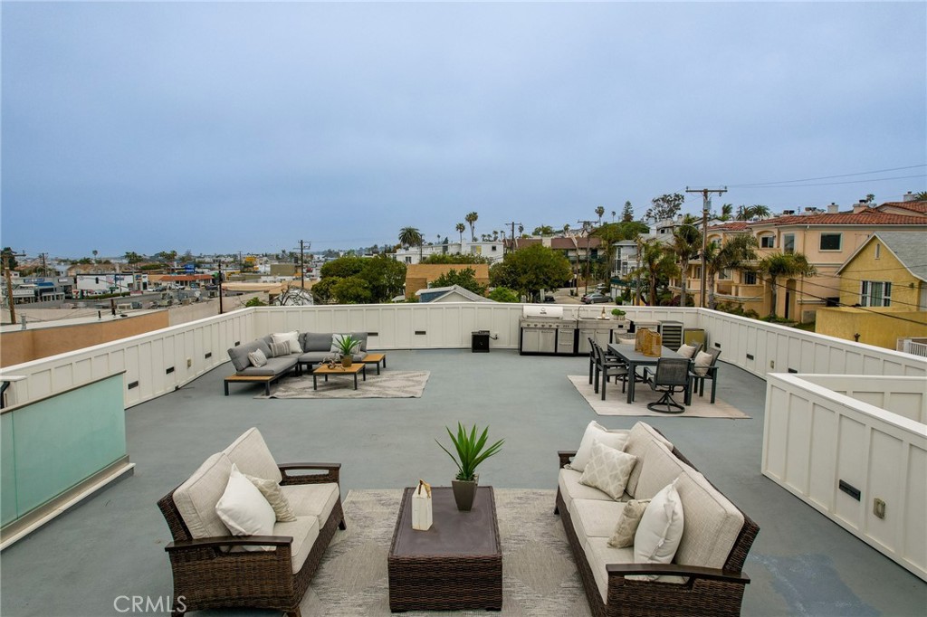 845 4th Street Hermosa Beach, CA 90254 - Photo 20 of 26 a view of a terrace with furniture and city view