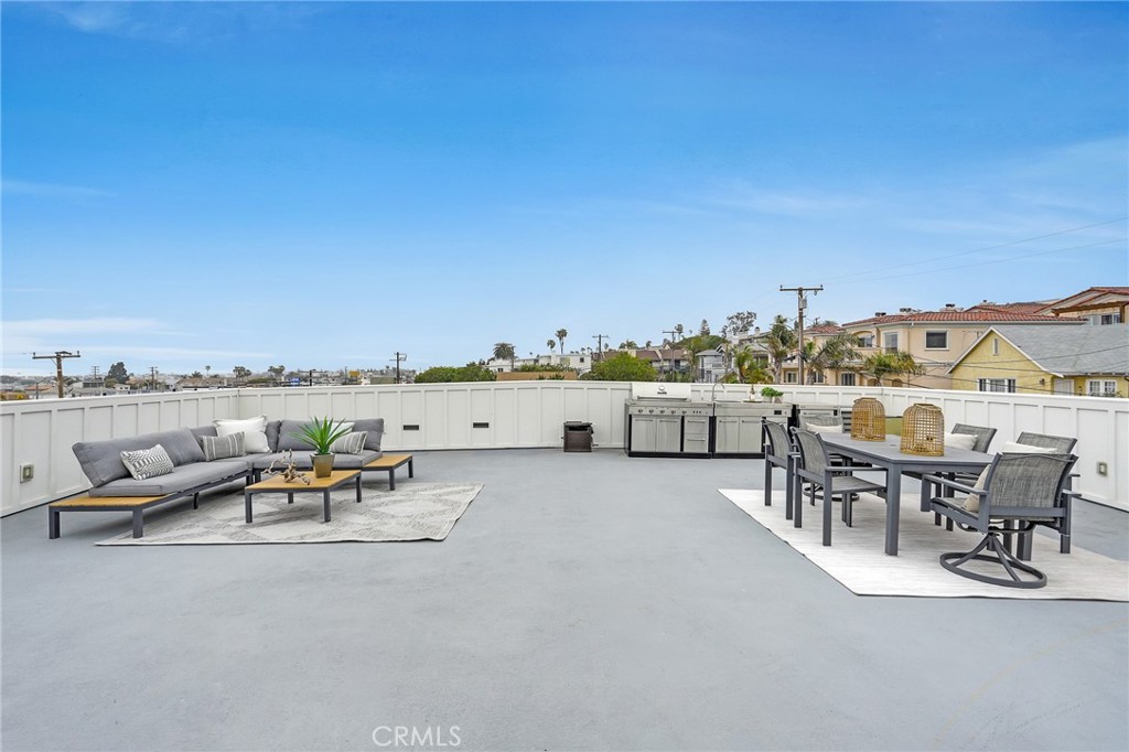 845 4th Street Hermosa Beach, CA 90254 - Photo 22 of 26 an outdoor space with furniture and stove