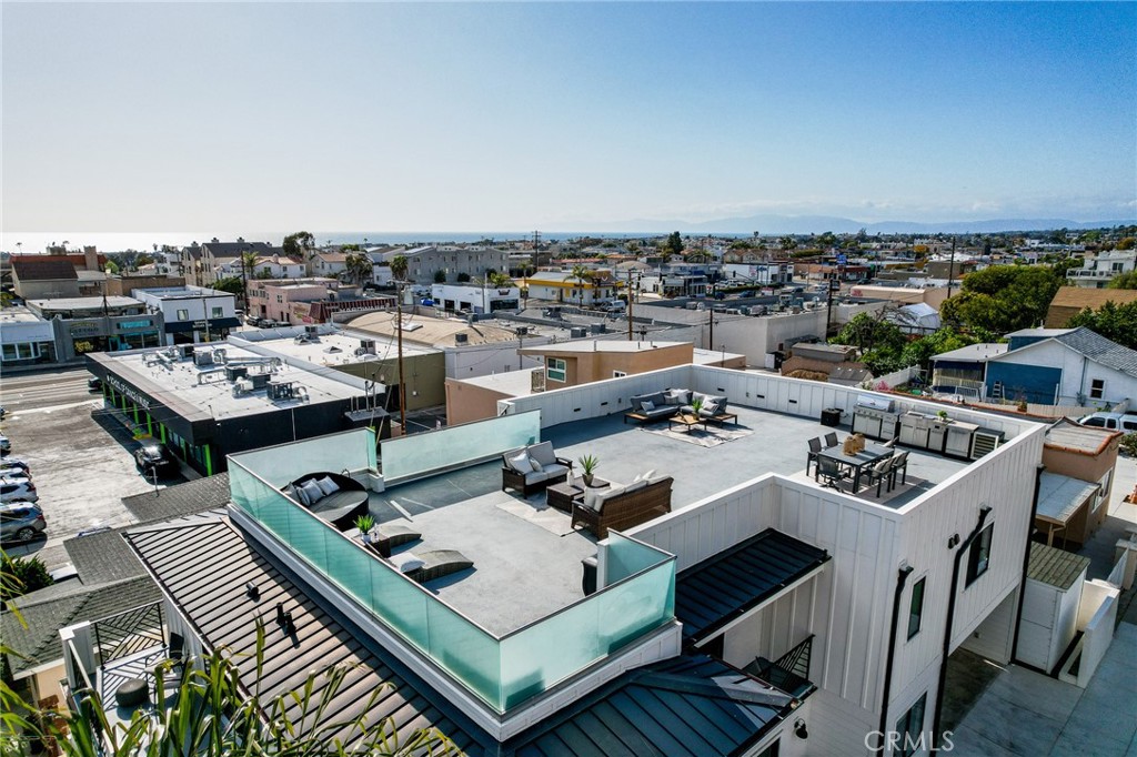 845 4th Street Hermosa Beach, CA 90254 - Photo 23 of 26 a view of a roof deck with furniture