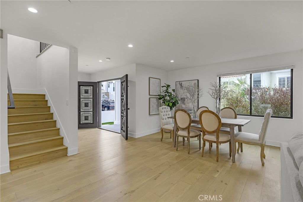 845 4th Street Hermosa Beach, CA 90254 - Photo 26 of 26 a dining room with furniture entryway and wooden floor
