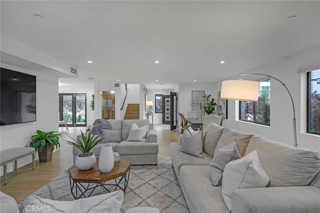 845 4th Street Hermosa Beach, CA 90254 - Photo 5 of 26 a living room with furniture and a large window