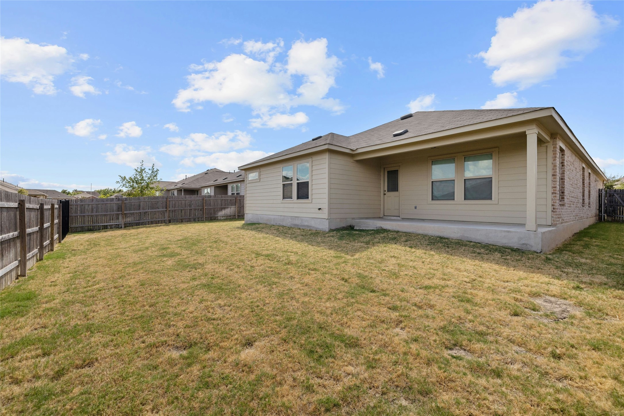 11813 Roscommon Trail Austin, TX 78754 - Photo 26 of 28 a house view with backyard space