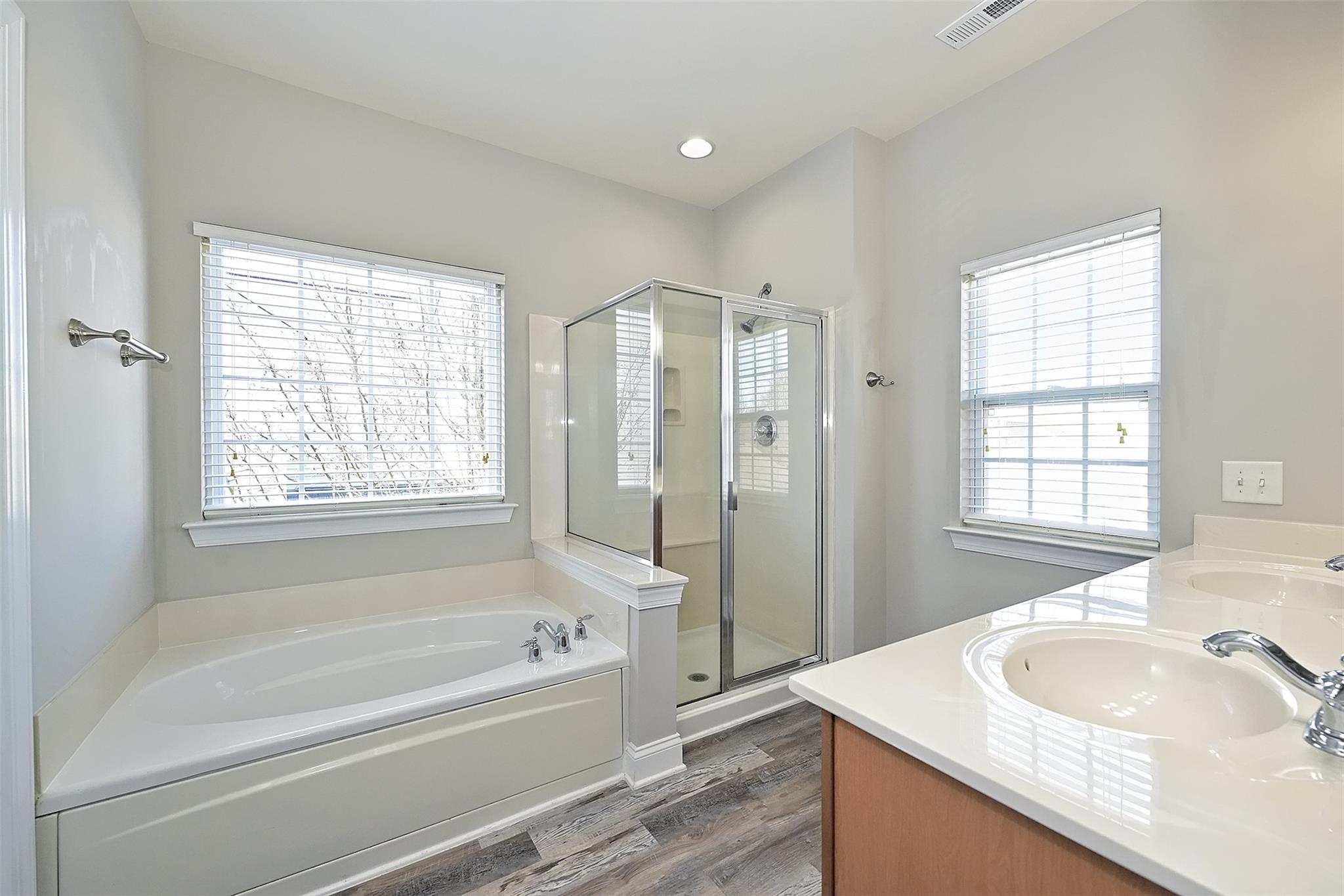 10725 Serape Road Charlotte, NC 28277 - Photo 21 of 30 a bathroom with a granite countertop tub sink and mirror