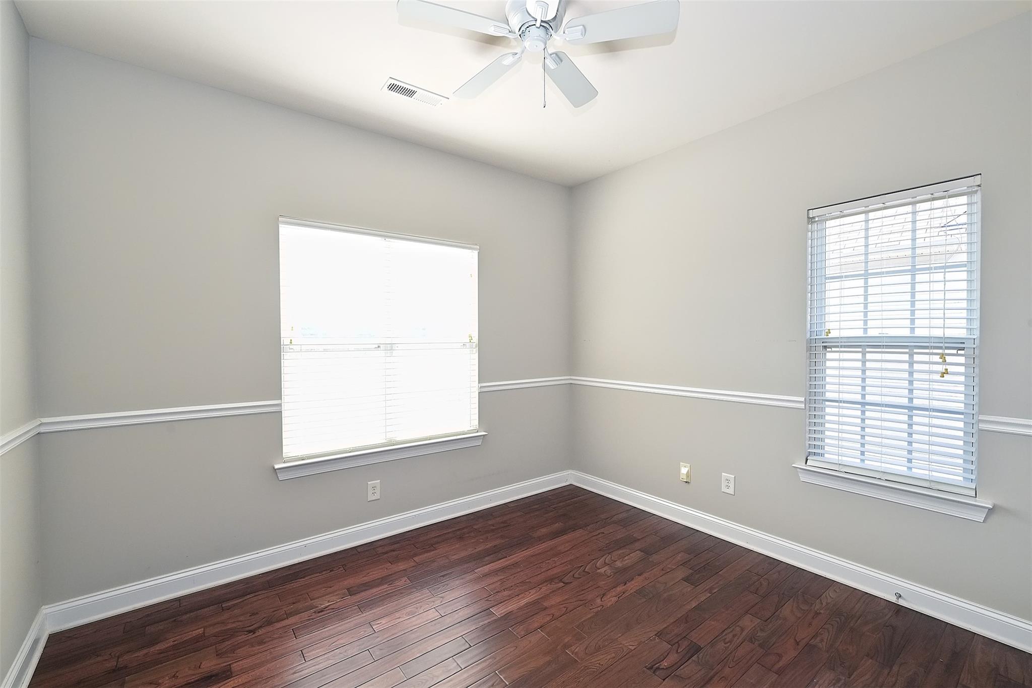 10725 Serape Road Charlotte, NC 28277 - Photo 24 of 30 wooden floor in an empty room with a window