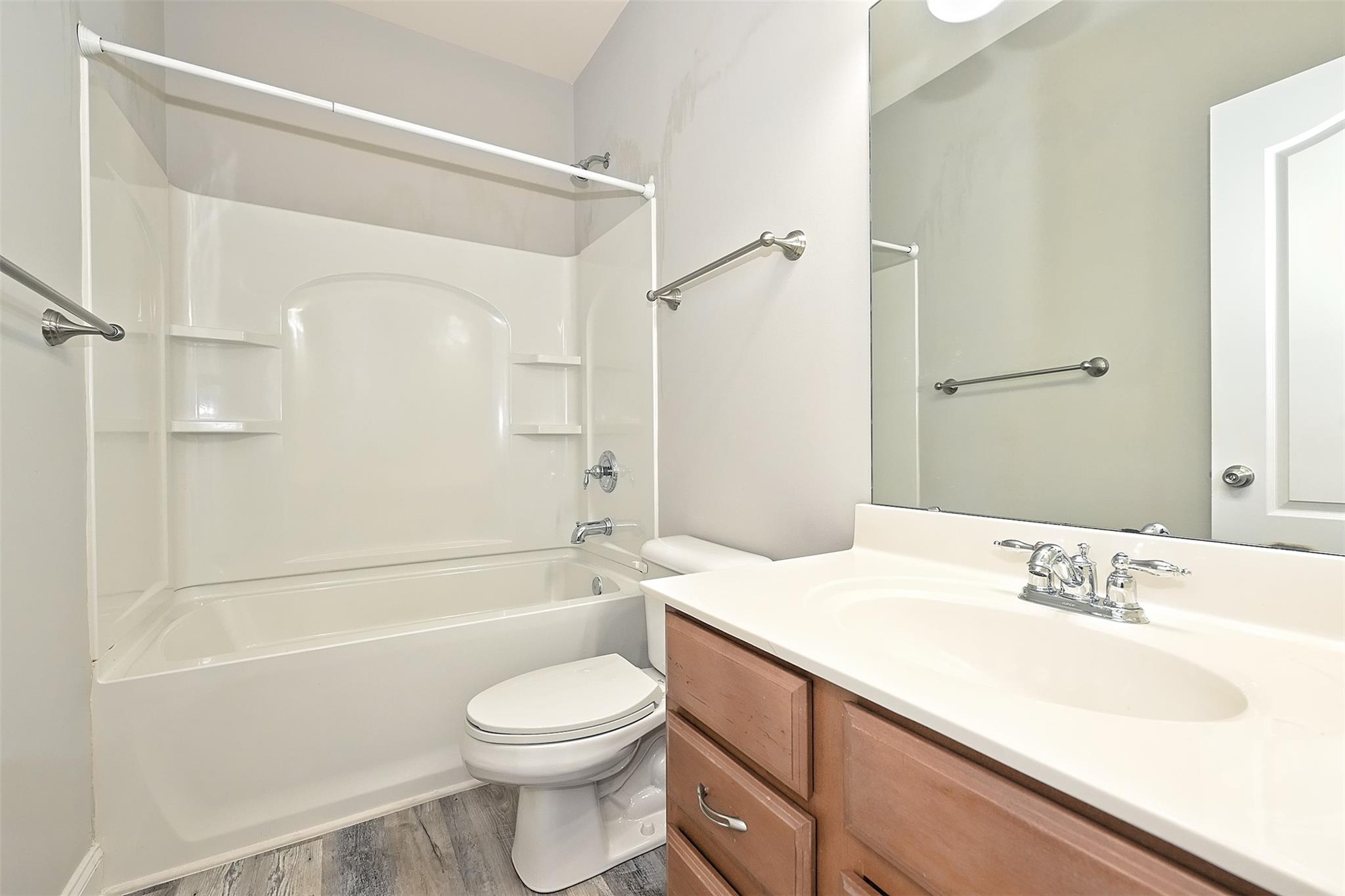 10725 Serape Road Charlotte, NC 28277 - Photo 25 of 30 a bathroom with a sink a toilet and a bathtub