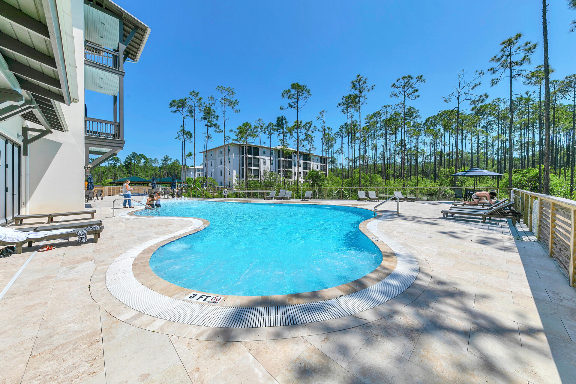 179 South County Highway 393, Unit 415 Santa Rosa Beach, FL 32459 - Photo 20 of 26 a view of a swimming pool with a patio