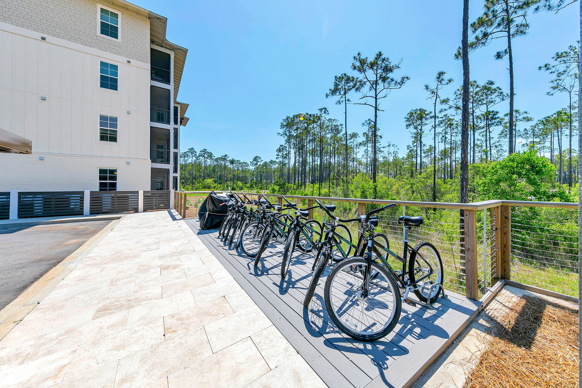 179 South County Highway 393, Unit 415 Santa Rosa Beach, FL 32459 - Photo 21 of 26 a view of a swimming pool with a table and chairs