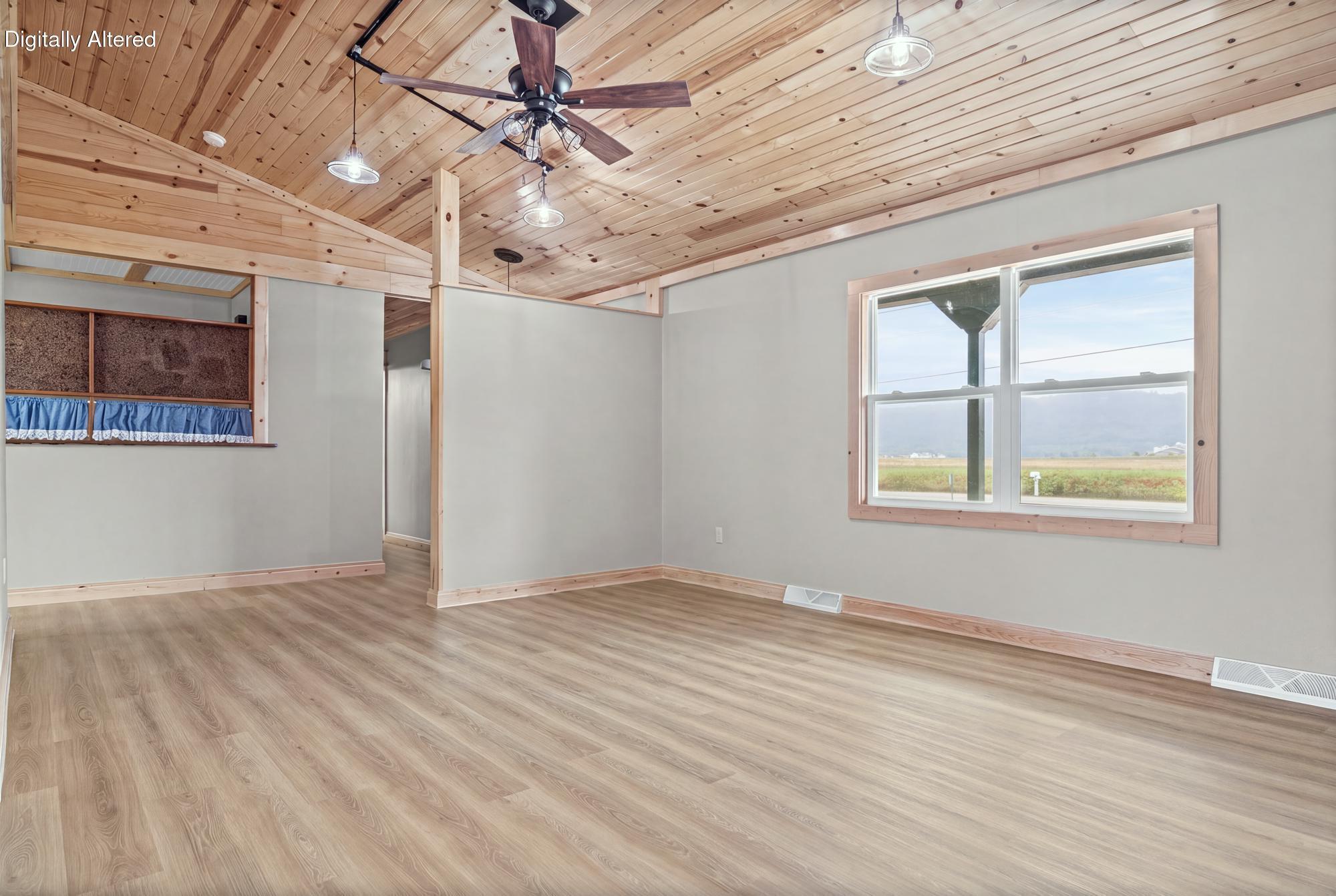 N7829 Amsterdam Prairie Road Holland, WI 54636 - Photo 6 of 45 Living room w/ vaulted ceiling