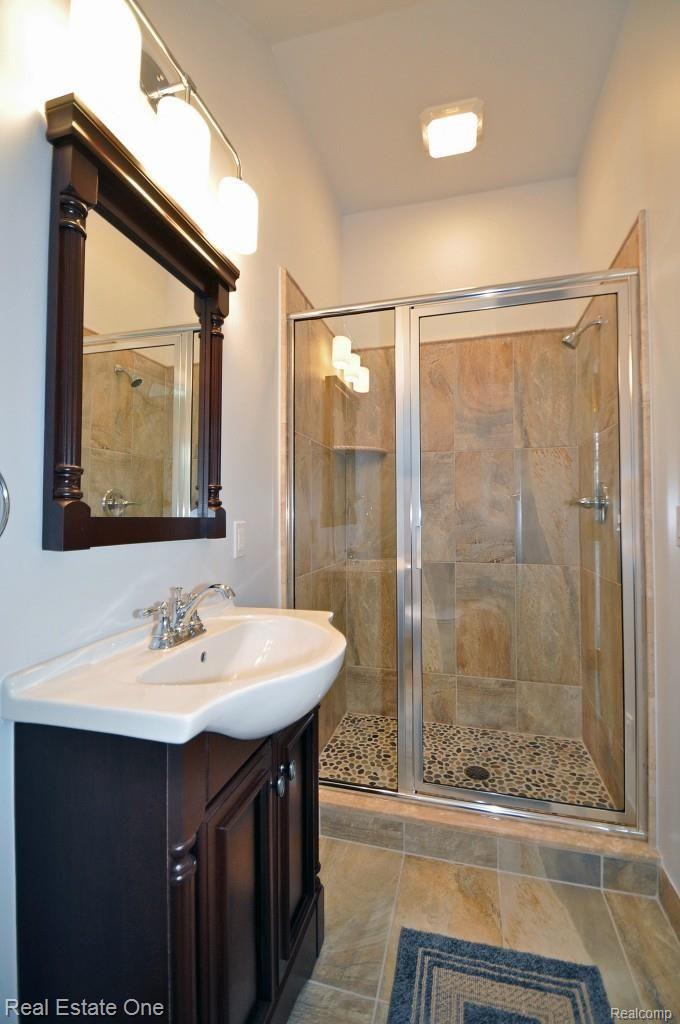 1271 South Renaud Road Grosse Pointe, MI 48236 - Photo 25 of 46 Brand new bath with custom-tiled shower