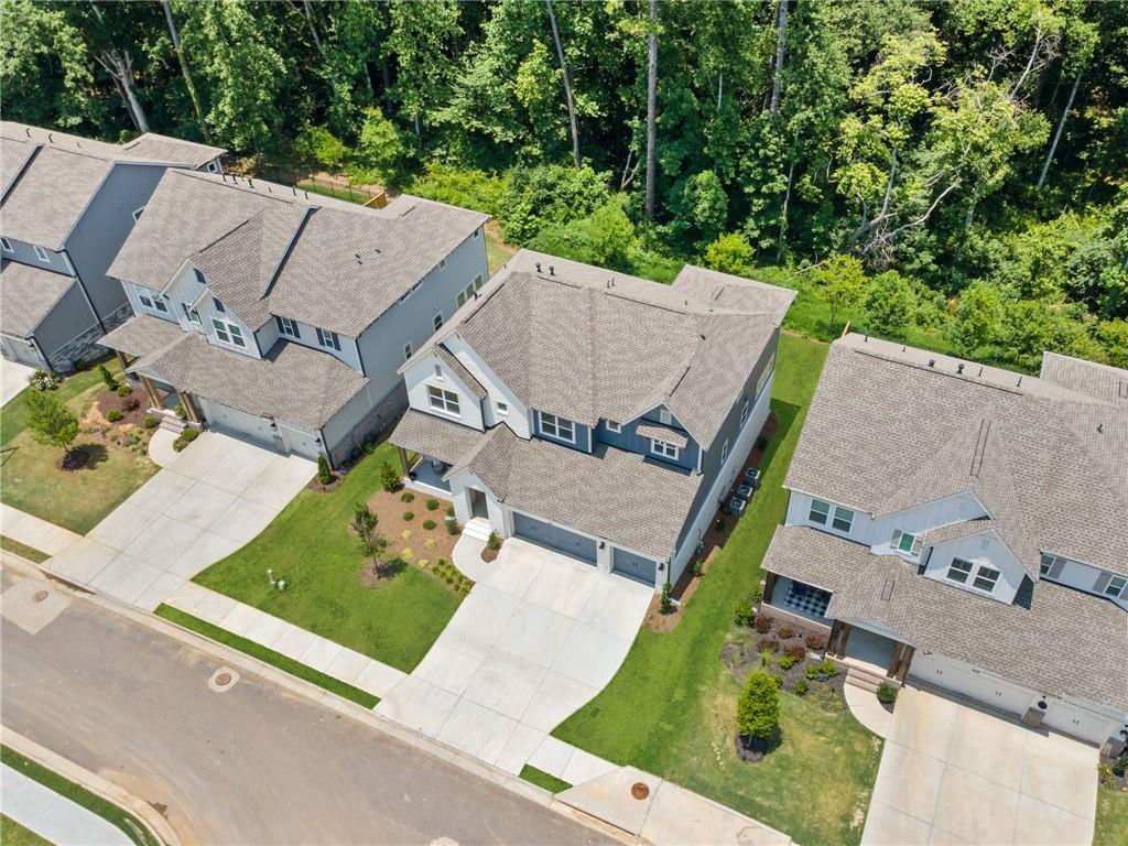 461 Maypop Lane Woodstock, GA 30188 - Photo 17 of 18 an aerial view of a house with garden space and street view