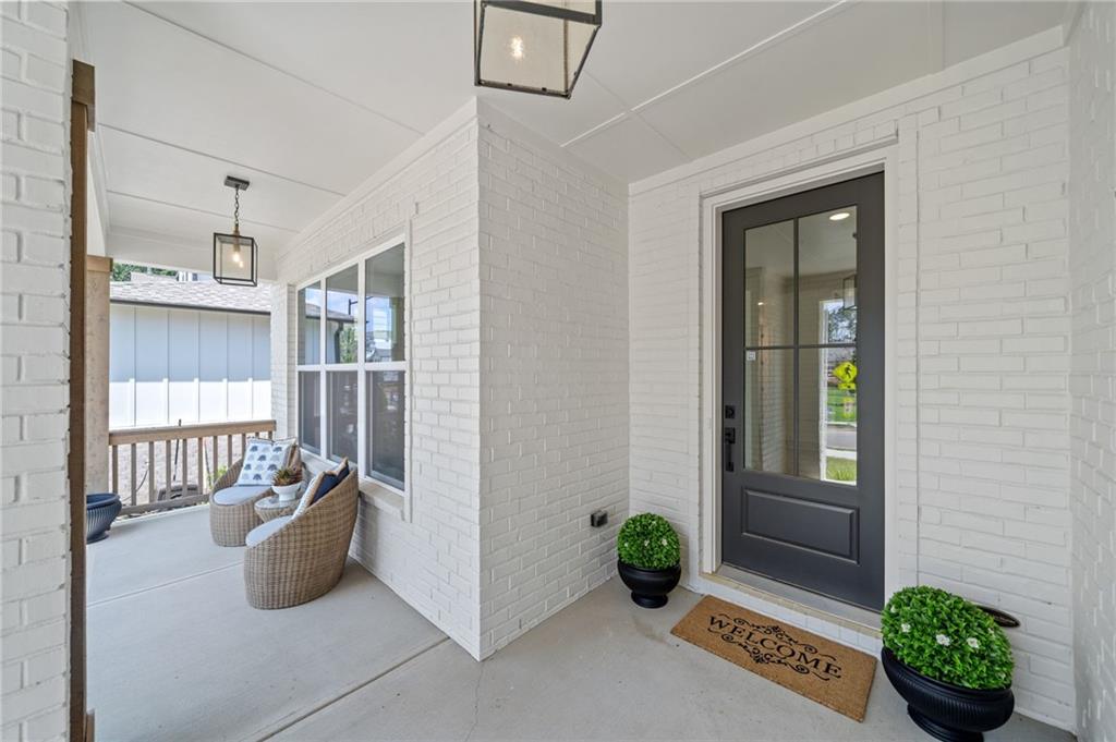 461 Maypop Lane Woodstock, GA 30188 - Photo 5 of 18 a view of an entryway with wooden floor and door