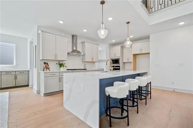 a kitchen with a sink cabinets and window