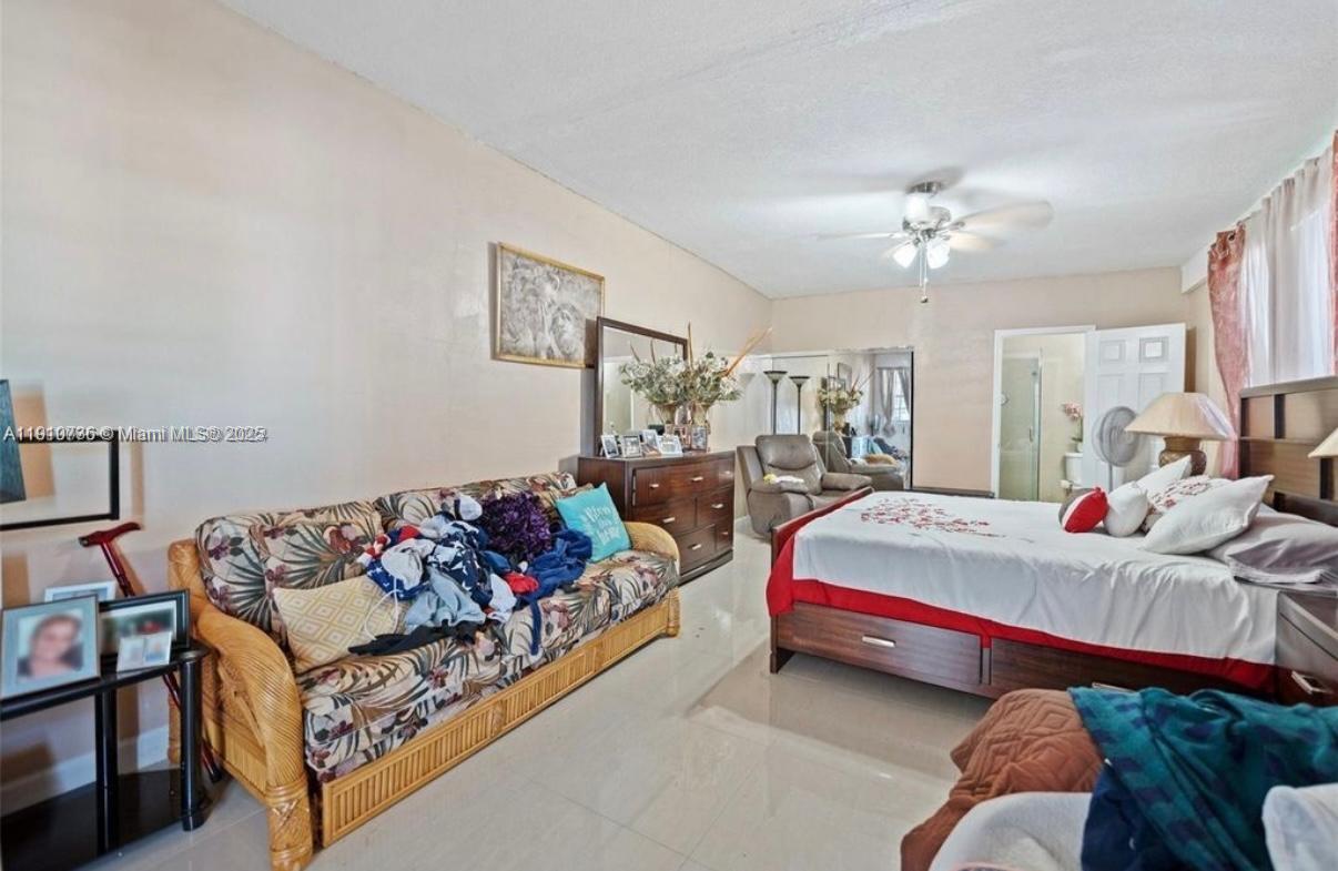 20235 Southwest 172nd Avenue Miami, FL 33187 - Photo 14 of 30 a living room with furniture