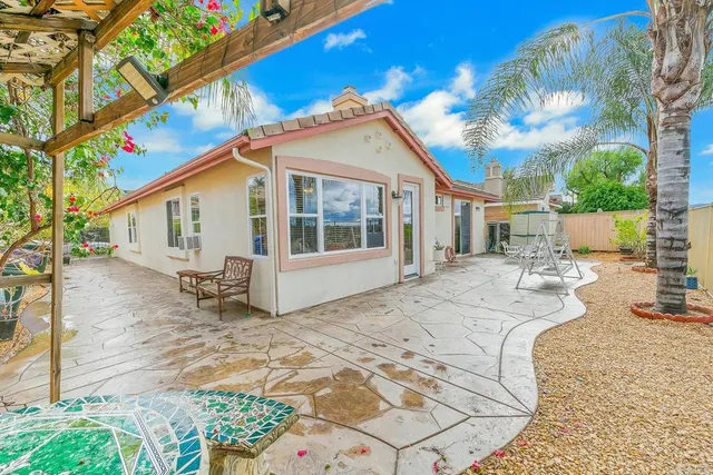 a view of a house with a patio