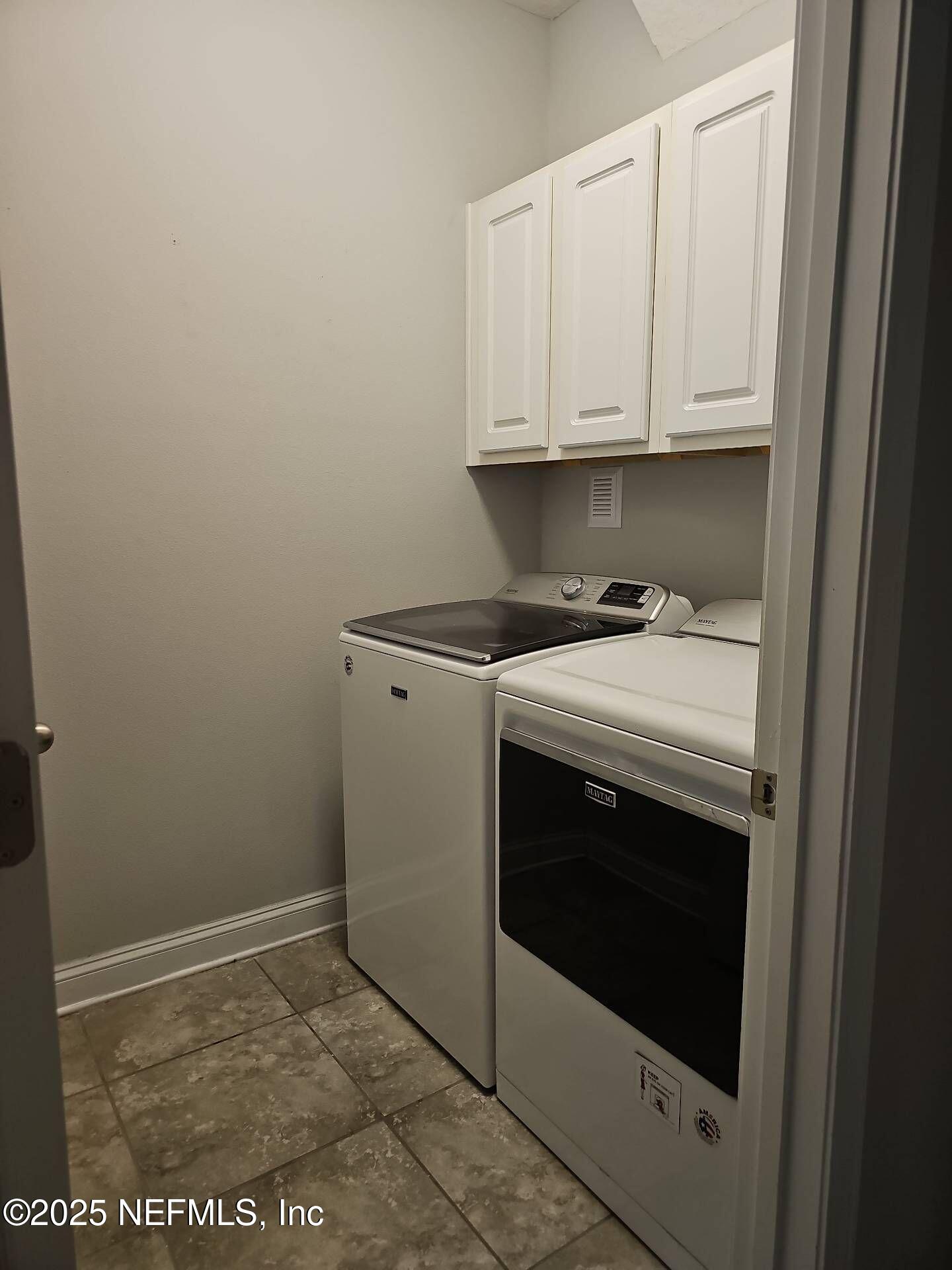 61 Boulder Rock Way St. Augustine, FL 32092 - Photo 10 of 20 a utility room with dryer and washer