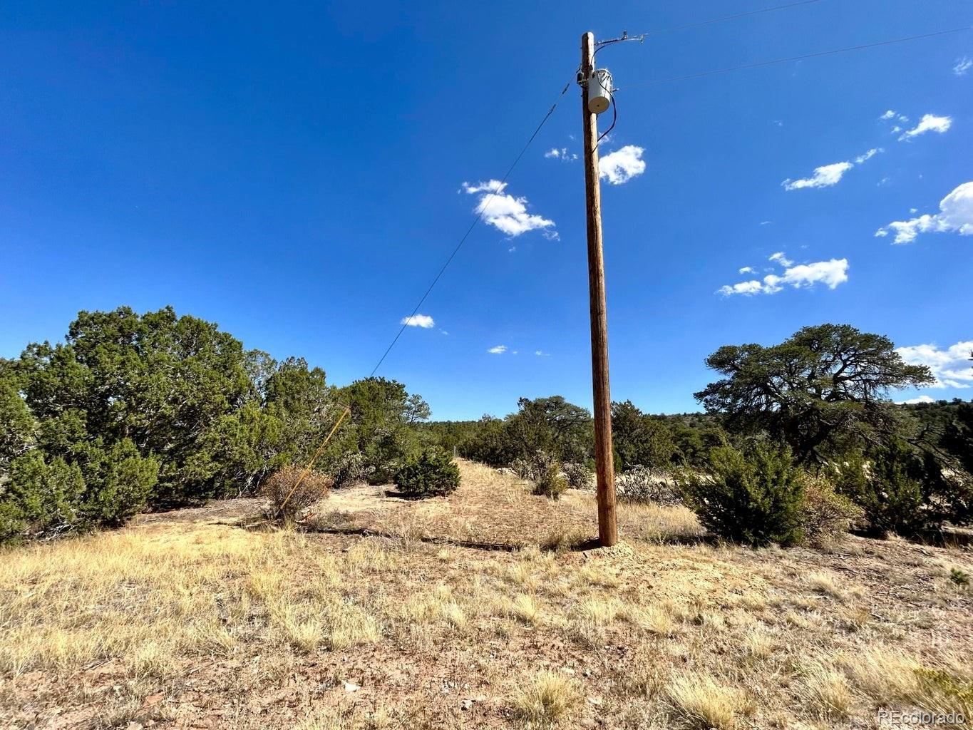 919 Los Vaqueros Circle Walsenburg, CO 81089 - Photo 3 of 10 a view of a house with a yard