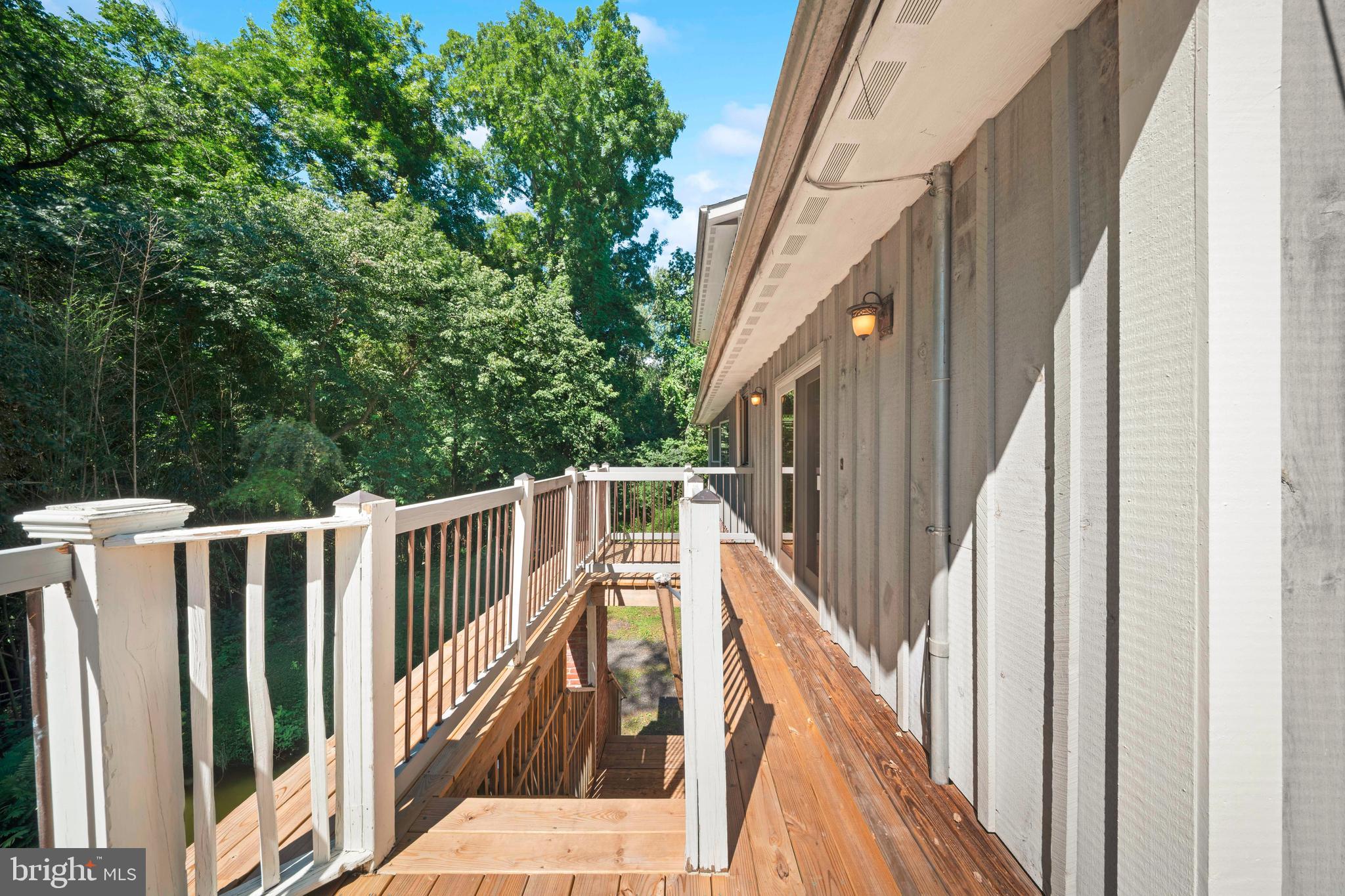 1473 North River Road Yardley, PA 19067 - Photo 10 of 42 a view of balcony with wooden floor and fence