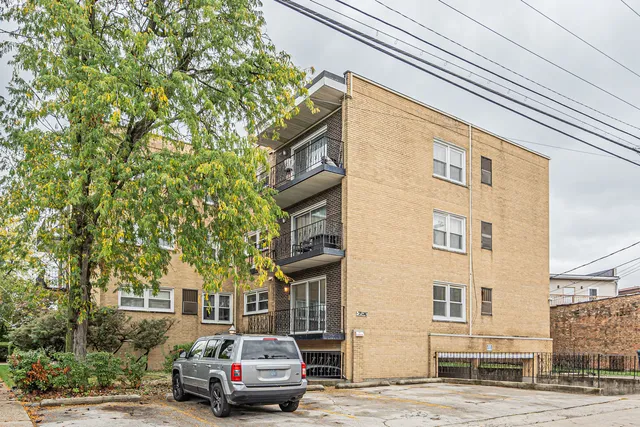 a car parked in front of a building