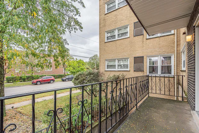 a view of a street from a balcony