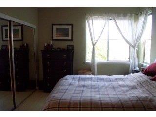 152 Everson Drive Santa Cruz, CA 95060 - Photo 6 of 7 a bedroom with a bed and a window