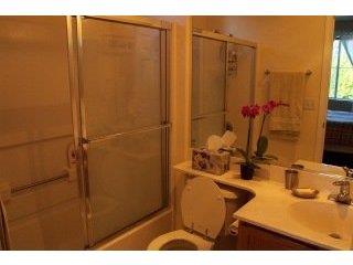 152 Everson Drive Santa Cruz, CA 95060 - Photo 7 of 7 a bathroom with a sink and a mirror