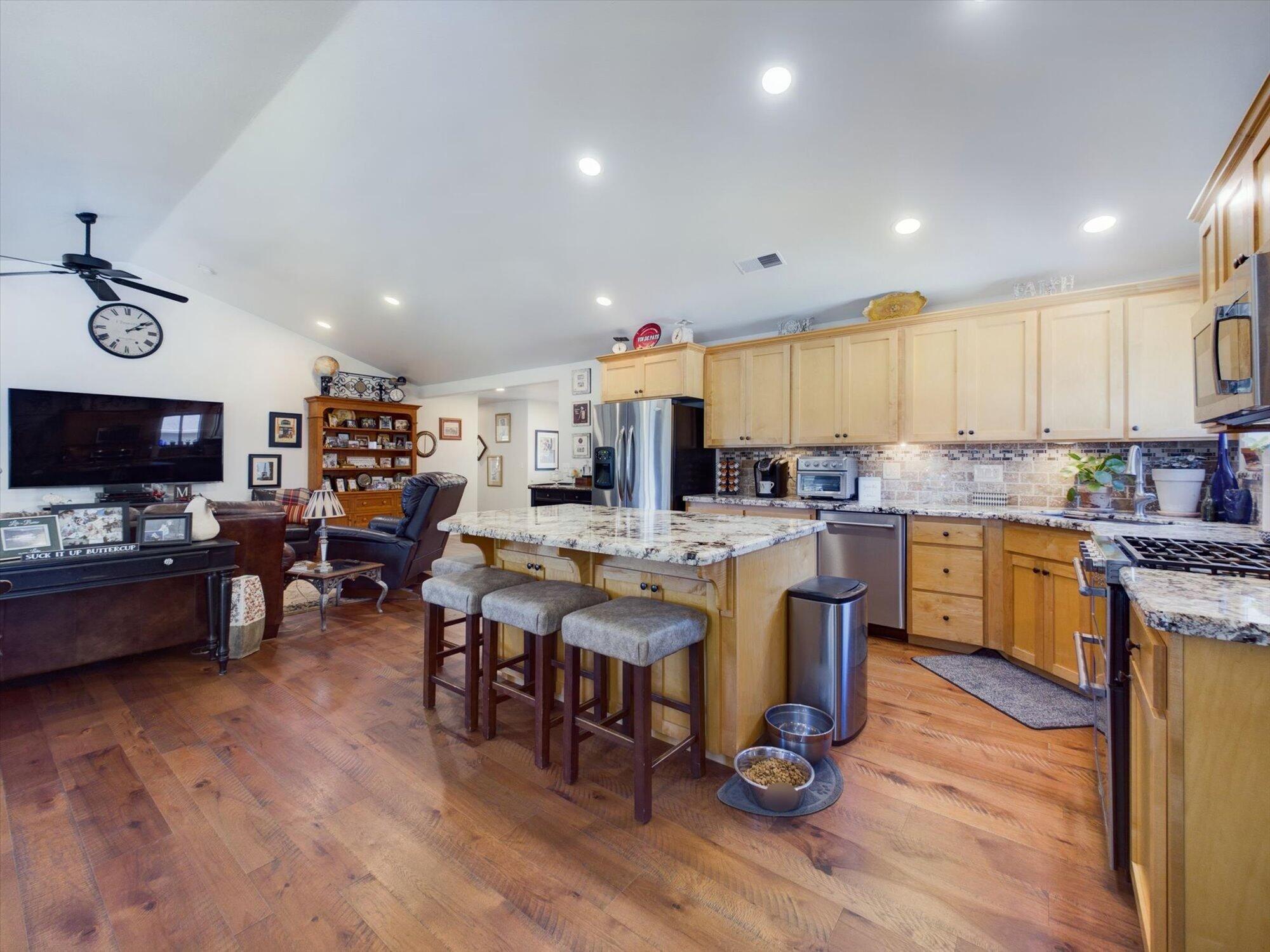 178 Grayland Heights Road Rio Dell, CA 95562 - Photo 15 of 52 a large kitchen with lots of counter and chairs
