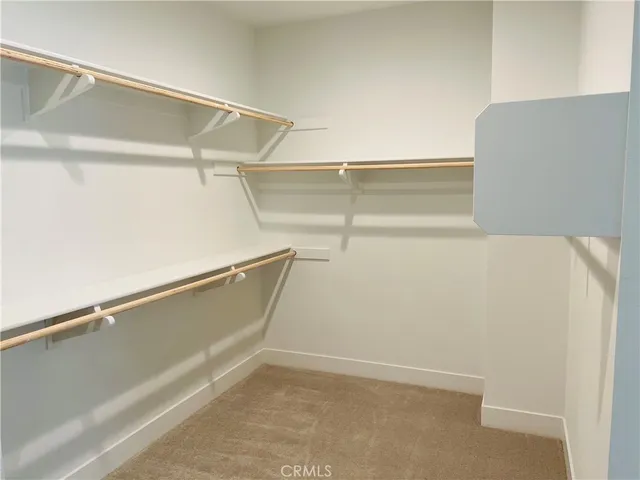 a view of an empty walk in closet
