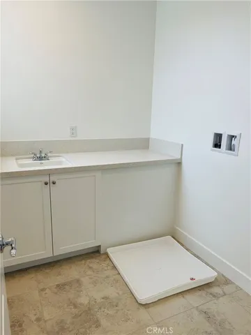 an empty room with a bench