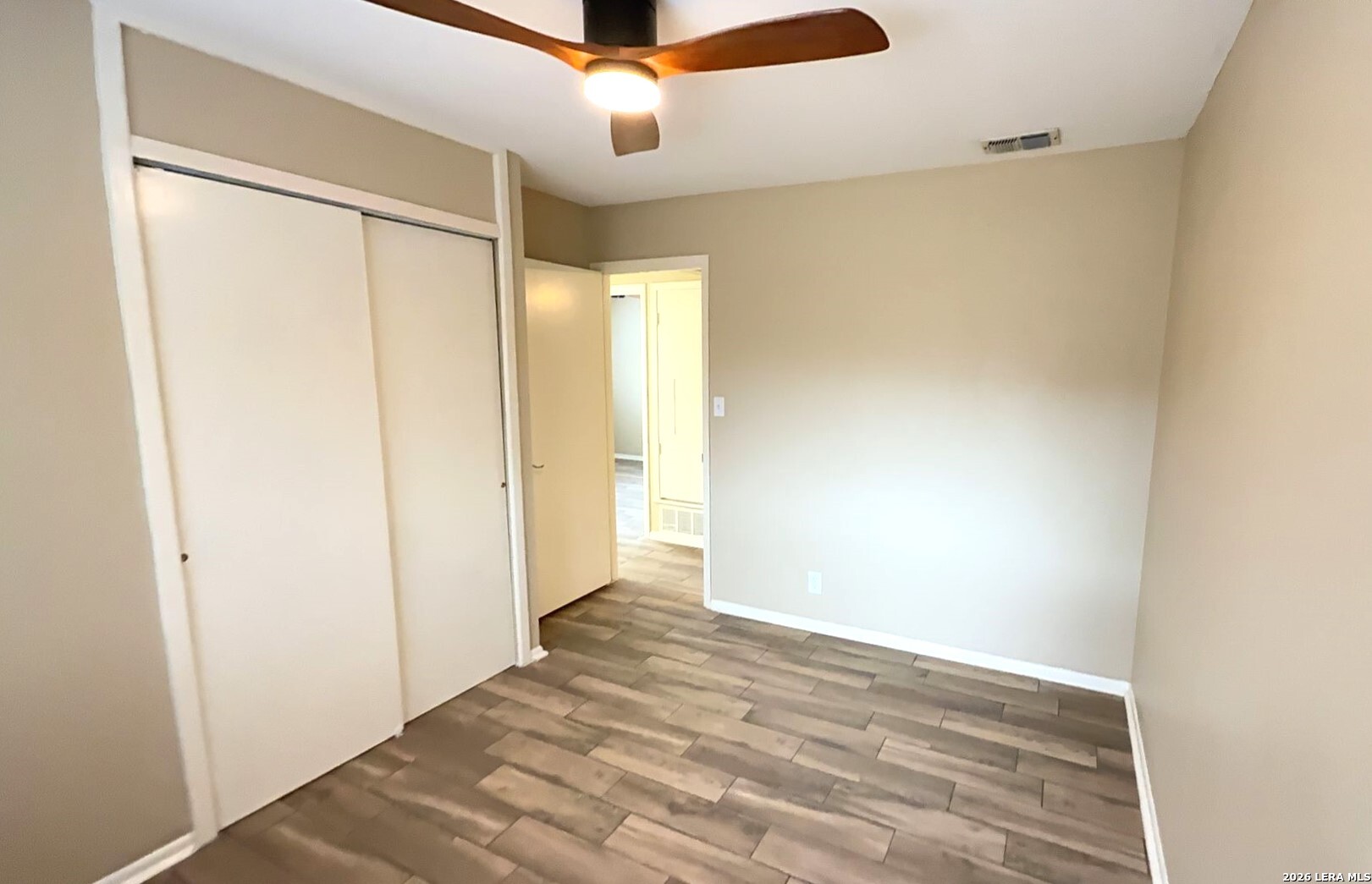 4119 Ramsgate Street San Antonio, TX 78230 - Photo 8 of 14 a view of a big room with wooden floor