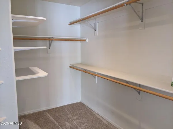 a view of a room with racks on the wall