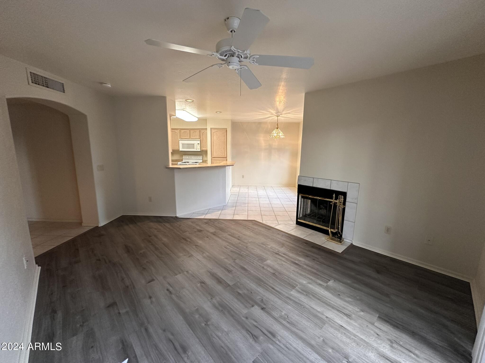 16715 East El Lago Boulevard, Unit 214 Fountain Hills, AZ 85268 - Photo 7 of 17 Living Room To Kitchen