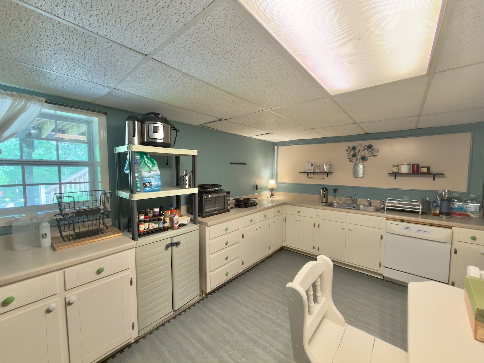 3080 Pleasant Ridge Road Woodbury, TN 37190 - Photo 16 of 19 a kitchen with sink cabinets and window